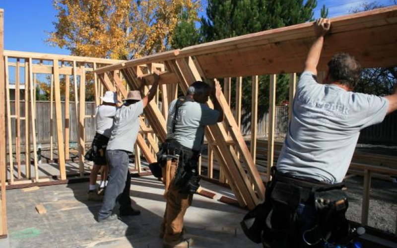 Putting up a support beam.